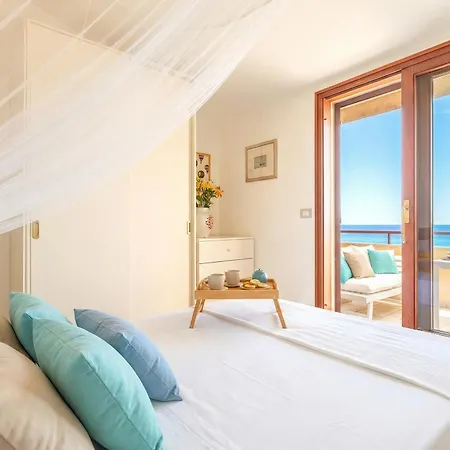 Clicksardegna Attic Vittoria With Terrace Facing The Sea And Parking Space